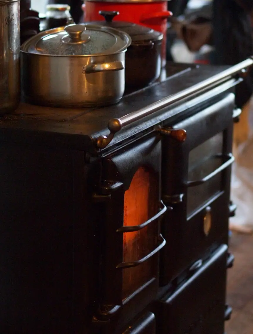 Cooking year-round on a wood cookstove: the dream, the reality, and the practicalities of relying on our own firewood and being off the gas grid